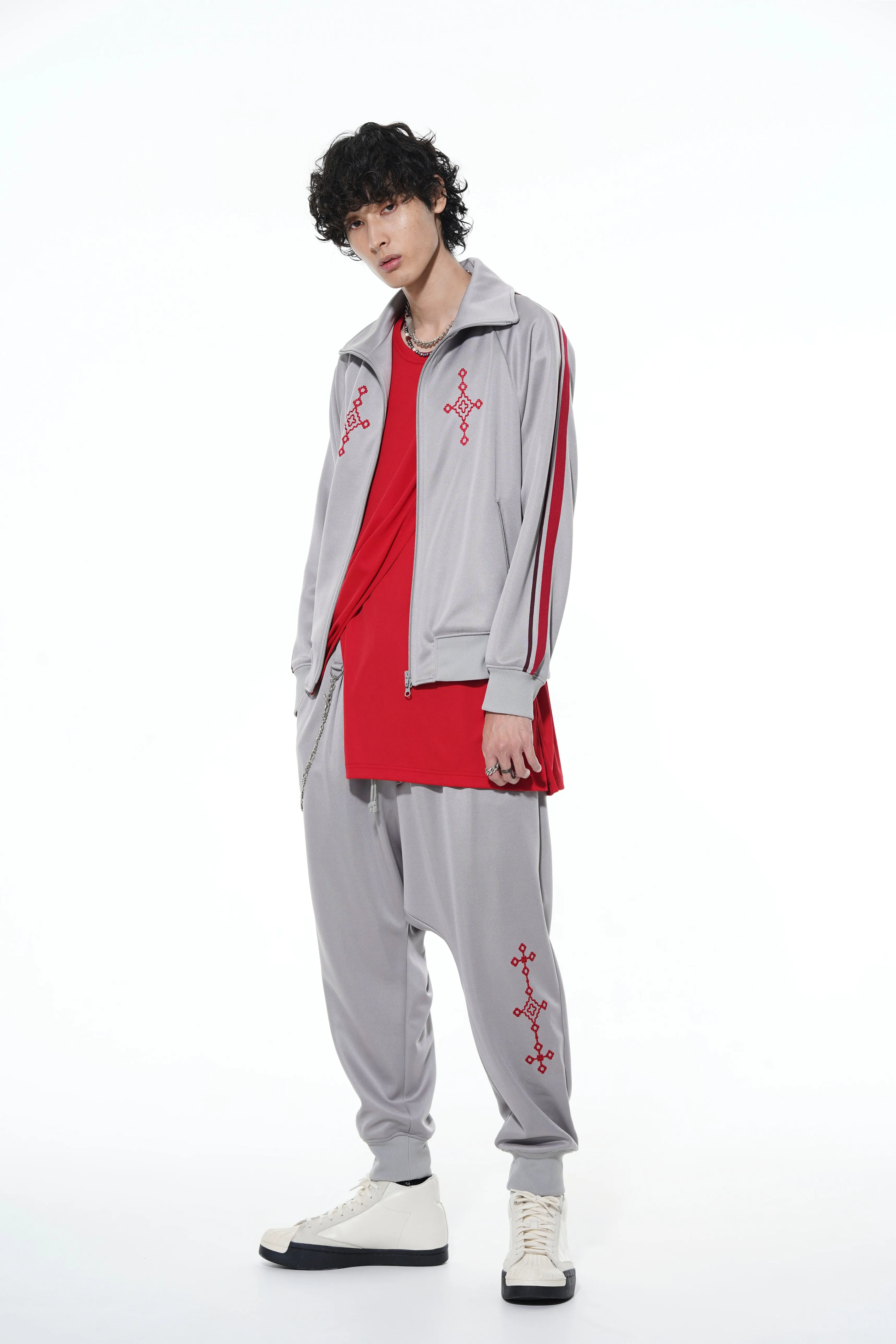 PE/SMOOTH JERSEY GEOMETRIC PATTERN EMBROIDERY SIDE TAPE LINE SAROUEL RIB PANTS